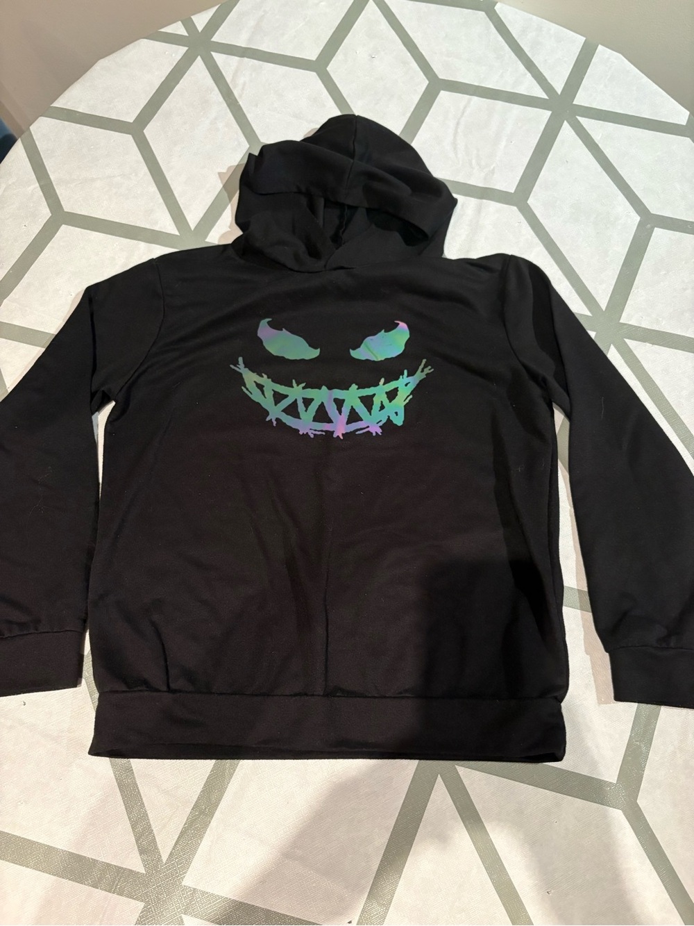 3/15$ SHEIN Black Hoodie with Iridescent Green-Purple Graphic